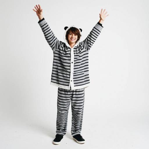 Boy in Panda Striped Pajamas Raising Arms