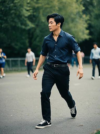 Young Man Walking Outdoors