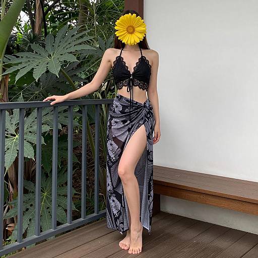 Young Woman with Flower on Deck