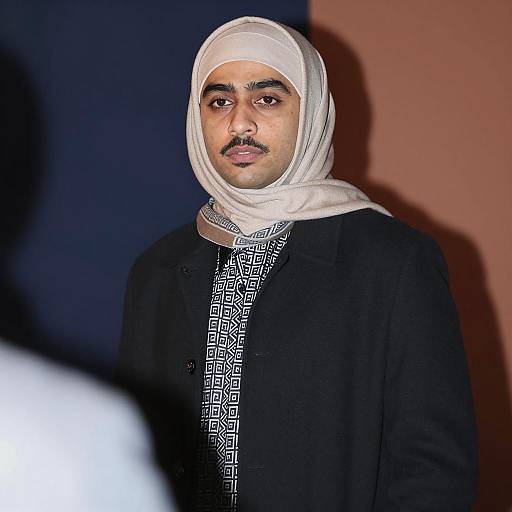 Stylish Man in Dimly Lit Background