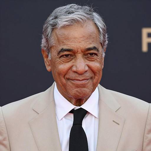 Confident Middle-aged Man in Beige Suit