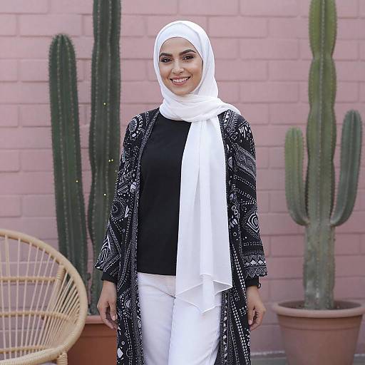 Smiling Woman in White Hijab Outdoors