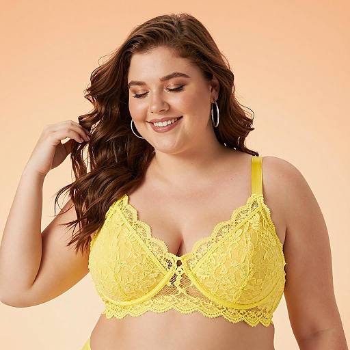 Joyful Plus-Size Woman in Yellow Bra
