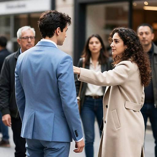 Woman Confronting Man in Urban Street Scene