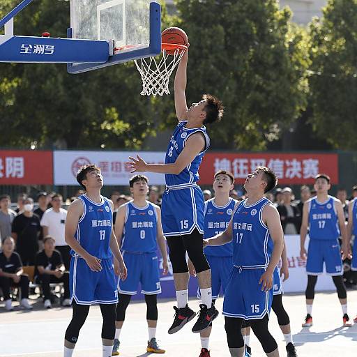 Dynamic Basketball Game Under Bright Sunlight