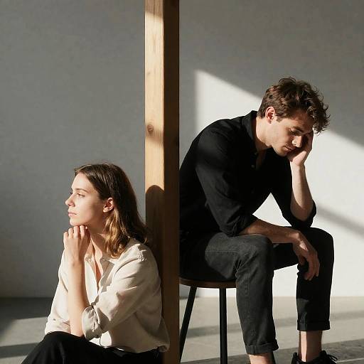 Contemplative couple in minimalist room