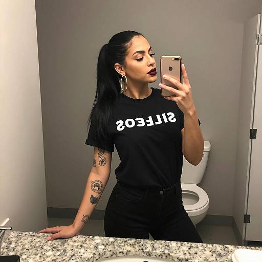 Woman Taking Mirror Selfie in Bathroom