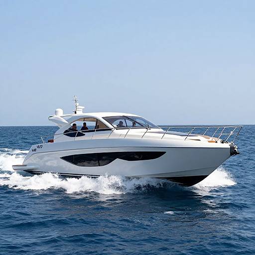 Photograph of a white, sleek, modern motor yacht cutting through deep blue ocean waves under a clear, bright blue sky.