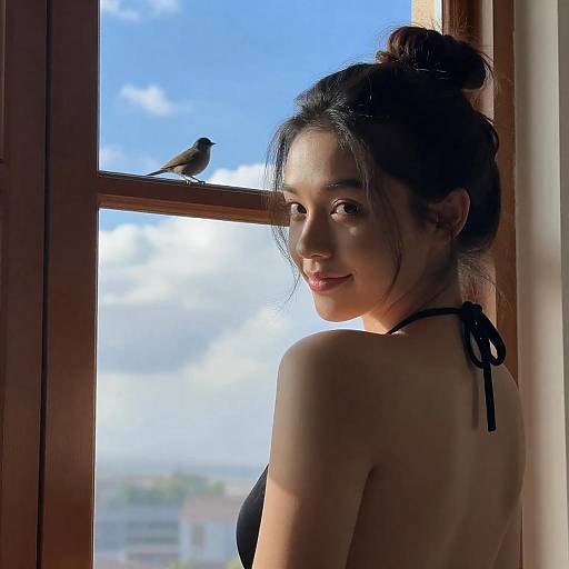 Sunlit Woman Looking Over Shoulder