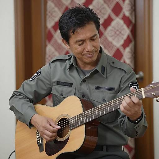Smiling Musician in Military Shirt