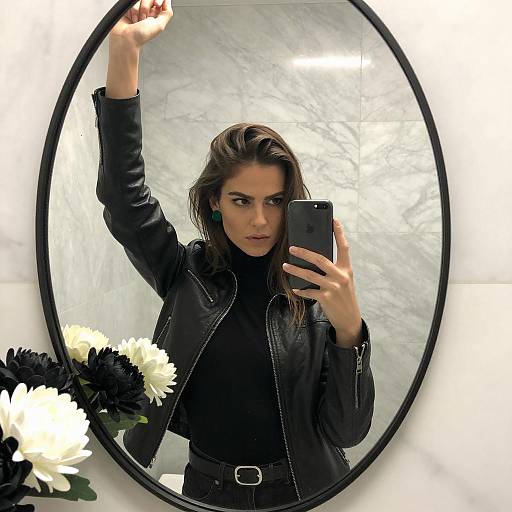 Woman Taking Selfie in Oval Mirror