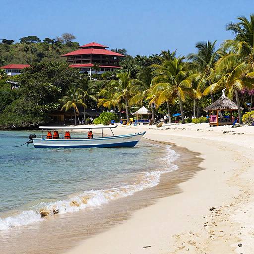 Tropical Beach with Boats and Red-roofed Building