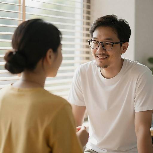Indoor Connection: Joyful Asian Couple