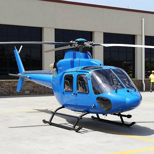 Bright Blue Helicopter on Sunny Tarmac