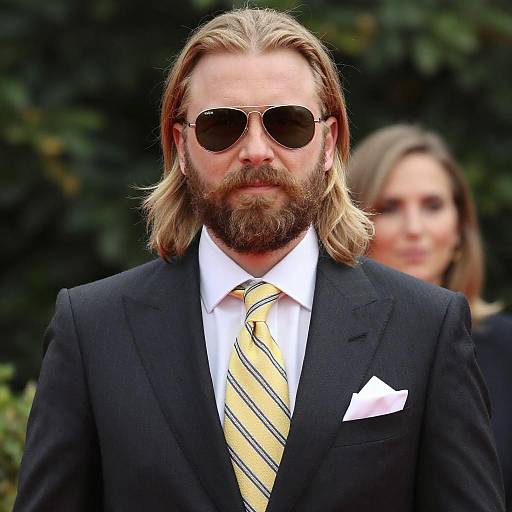 Dapper Man with Blonde Hair and Aviators