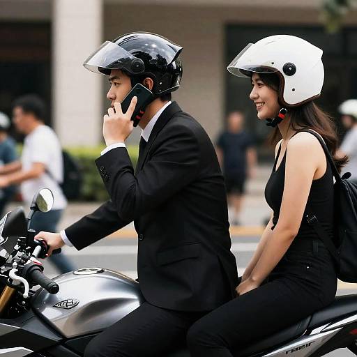 Stylish Urban Encounter on a Motorcycle