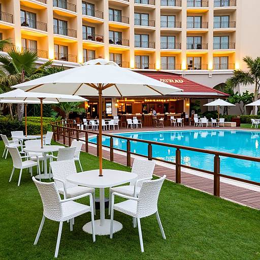 Lush Outdoor Seating by Serene Pool