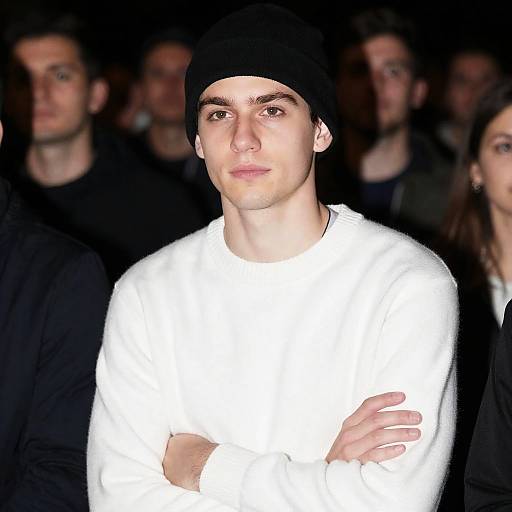 Young Man in White Sweater and Black Beanie