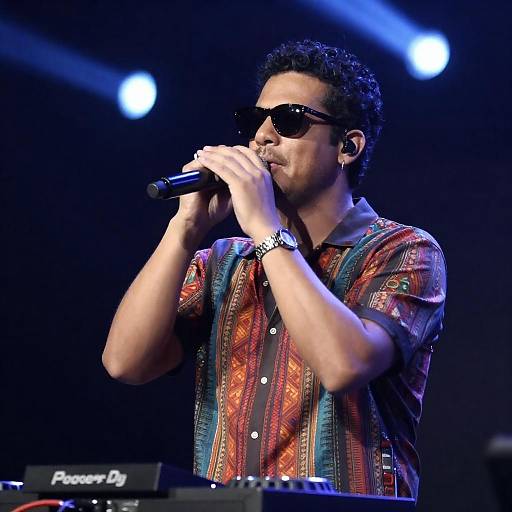 Curly-Haired Singer in Colorful Shirt