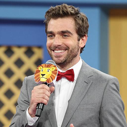 Man in Gray Suit with Lion Microphone