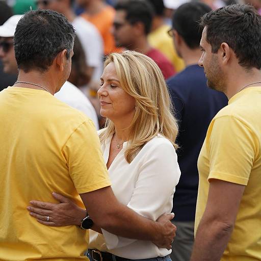 Blonde Woman Embraced in Busy Crowd