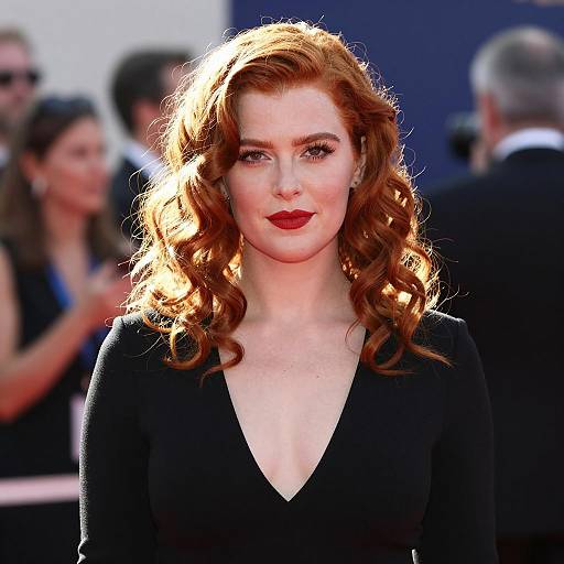Woman with Red Curly Hair in Black Dress
