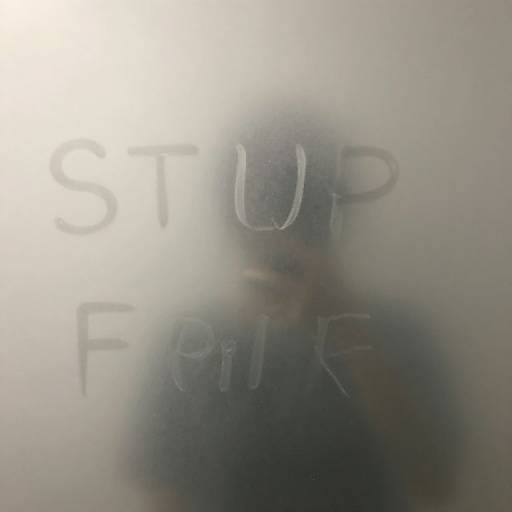 Photograph of a person with blurred face and 