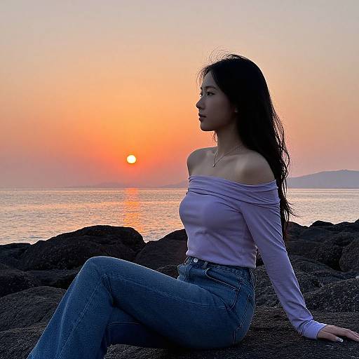 Serene Sunset Portrait on Rocky Shore
