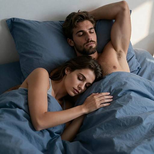 Intimate Couple in Blue Sheets Portrait