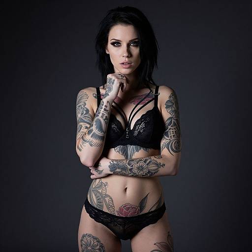 Tattooed Woman in Dramatic Lighting