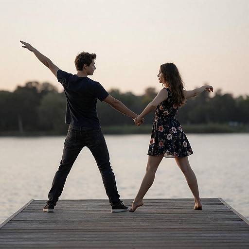 Couple Dancing on Dock at Sunset