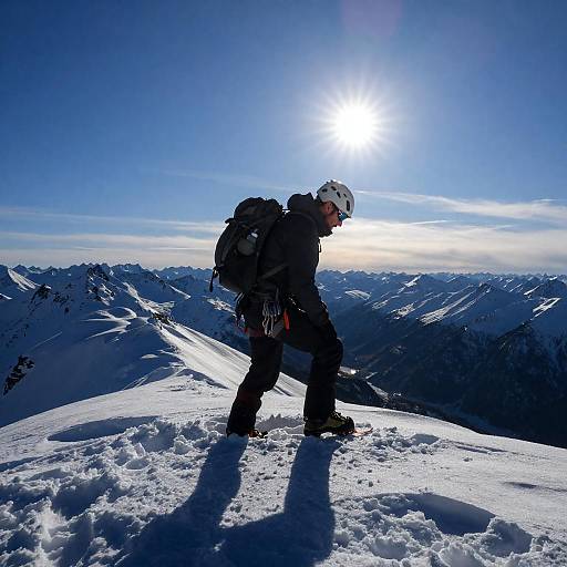 Sunlit Silhouette on Snowy Peak