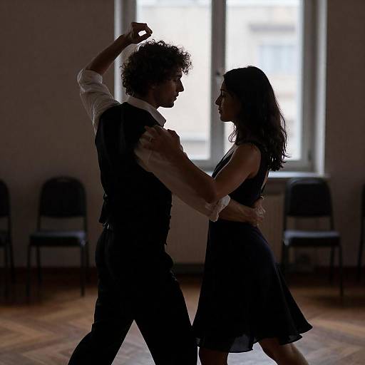 Couple Dancing in Dimly Lit Room