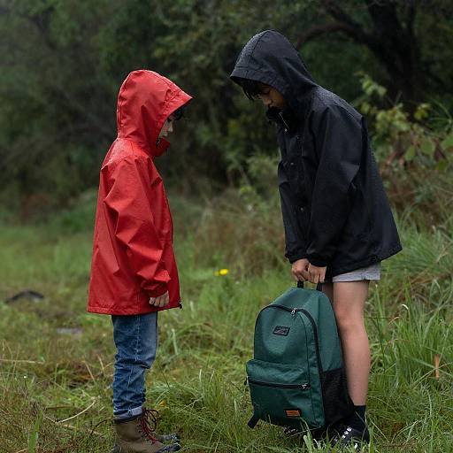 Children in a Rainy Wooded Field