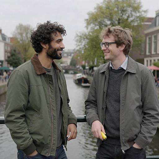 Two Men Enjoying a Canal Bridge Moment