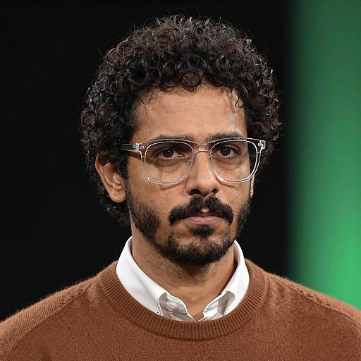 Serious Portrait of a Man with Glasses