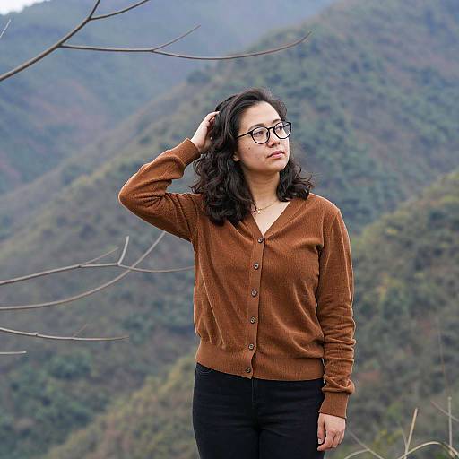 Woman in Brown Cardigan in Mountain Landscape