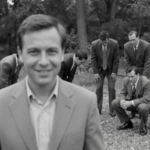 Smiling Man in a Forest Gathering