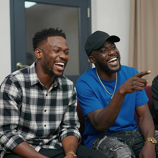 Joyful Interaction Between Two Friends Inside