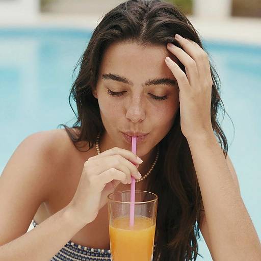 Relaxed Woman Enjoying Orange Drink