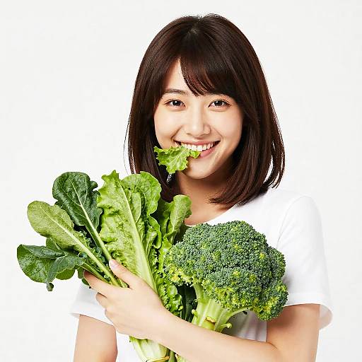 Cheerful Woman Holding Fresh Vegetables