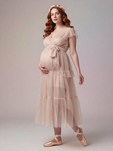Elegant Pregnant Woman in Ethereal Maternity Dress