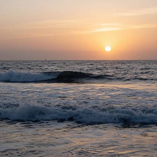 Photograph of a serene ocean at sunset, with golden-orange sky, calm waves, and a distant sailboat on the horizon.