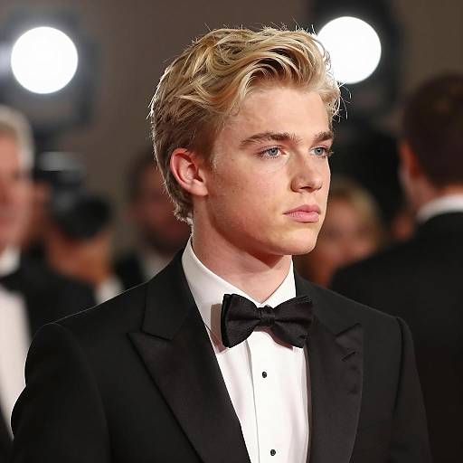 Young Man in Black Tuxedo at Event