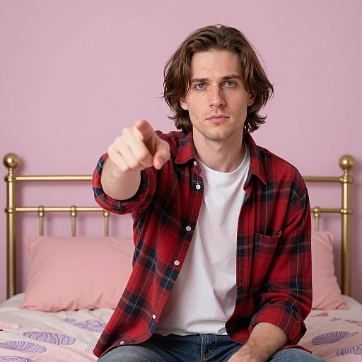Man on Gold Bed with Neutral Expression