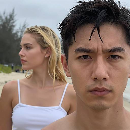 Intense Beach Portrait: Man and Woman