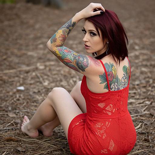 Red-Haired Tattooed Woman Outdoors