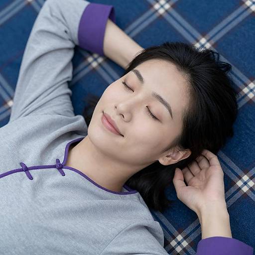 Serene Asian Woman on Blue Plaid