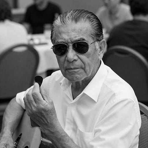 Black-and-White Portrait of Focused Older Guitarist