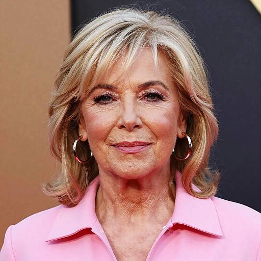 Elegant Older Woman in Pink Jacket